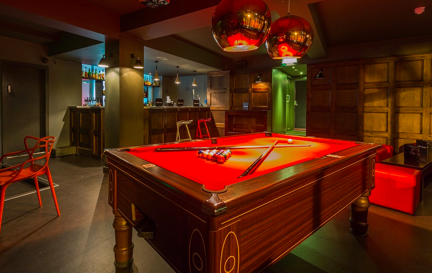 Private Ballroom at Brickhouse Social with red pool table for networking events.