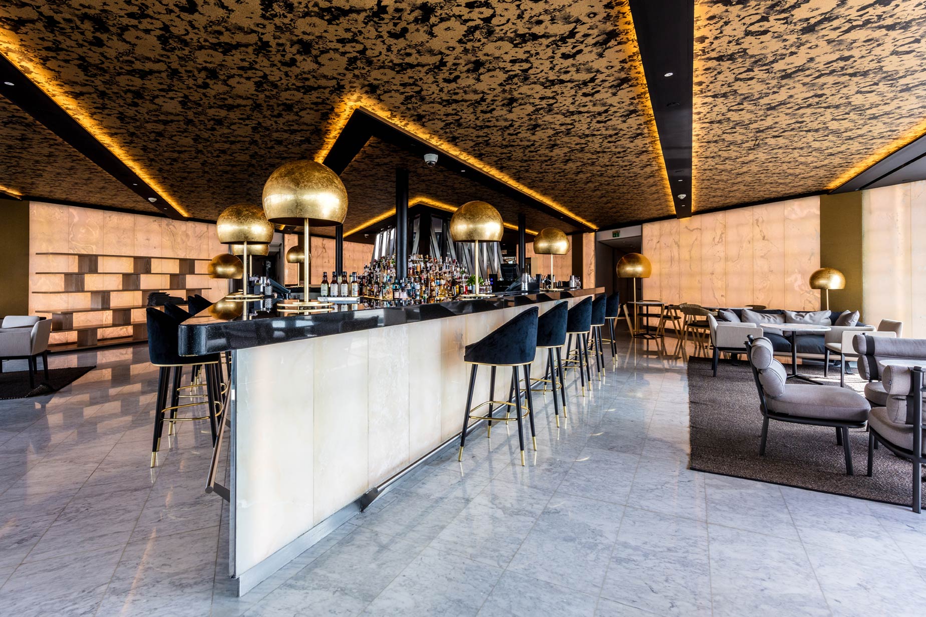 Exclusive Hire at Radio Rooftop London, modern bar with elegant lighting for upscale events.