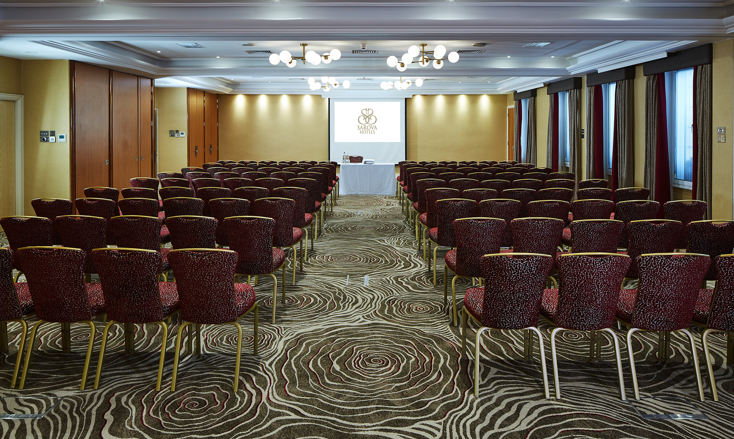 Kings Suite meeting room with elegant decor, ideal for conferences and workshops.