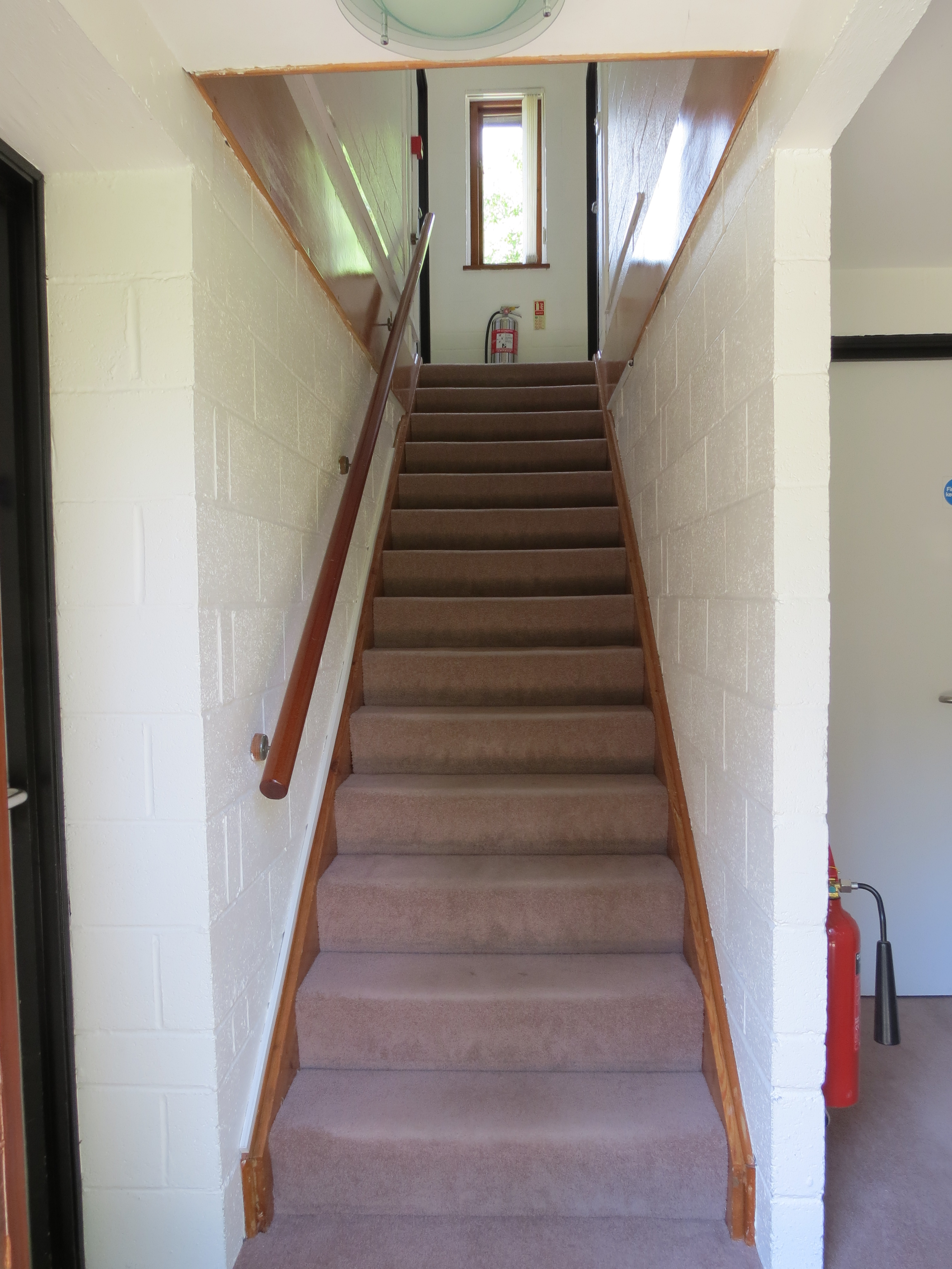 Staircase in Egrove Park Venue, Oxford, enhancing event flow and accessibility.