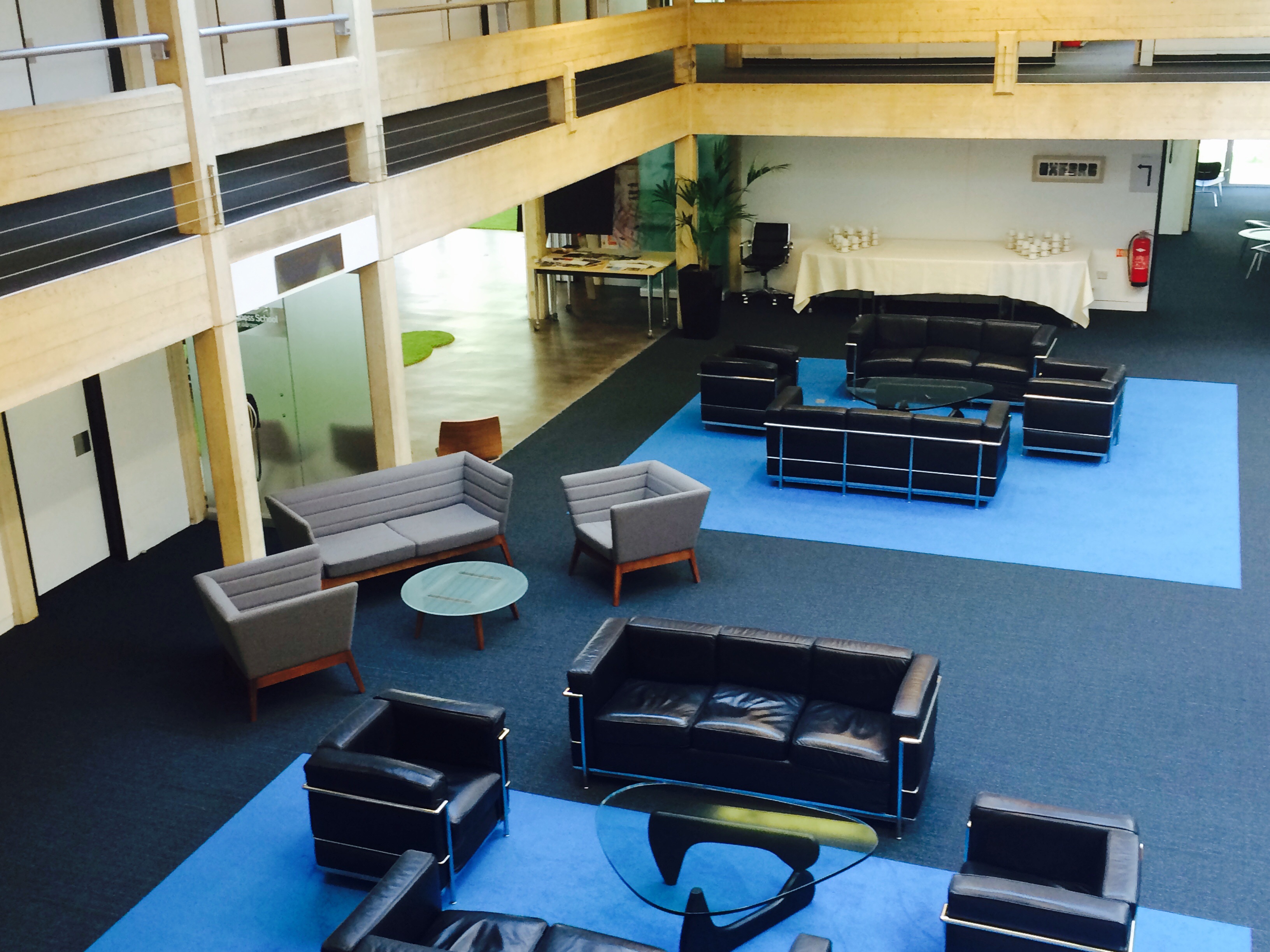 Spacious event space at Egrove Park, Oxford with modern seating for meetings and networking.