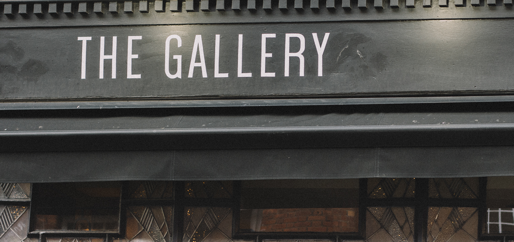 Stylish event venue "The Gallery" with sophisticated exterior for art exhibitions and gatherings.