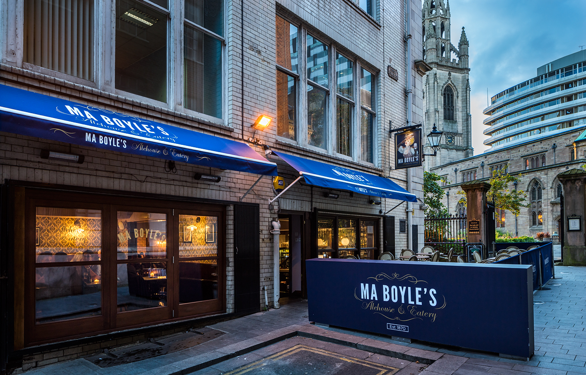 Rum and Rumour Kabaret Bar outdoor seating, ideal for casual meetings and social events.