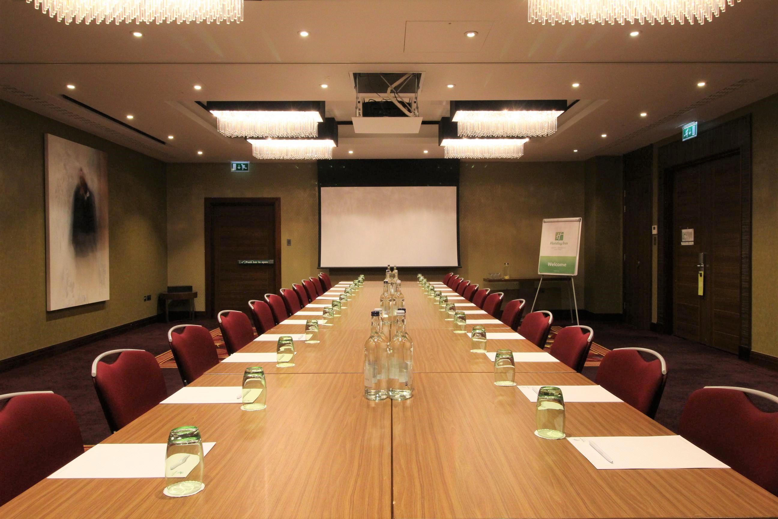 Buckingham Suite meeting room at Holiday Inn Kensington, ready for presentations and collaboration.