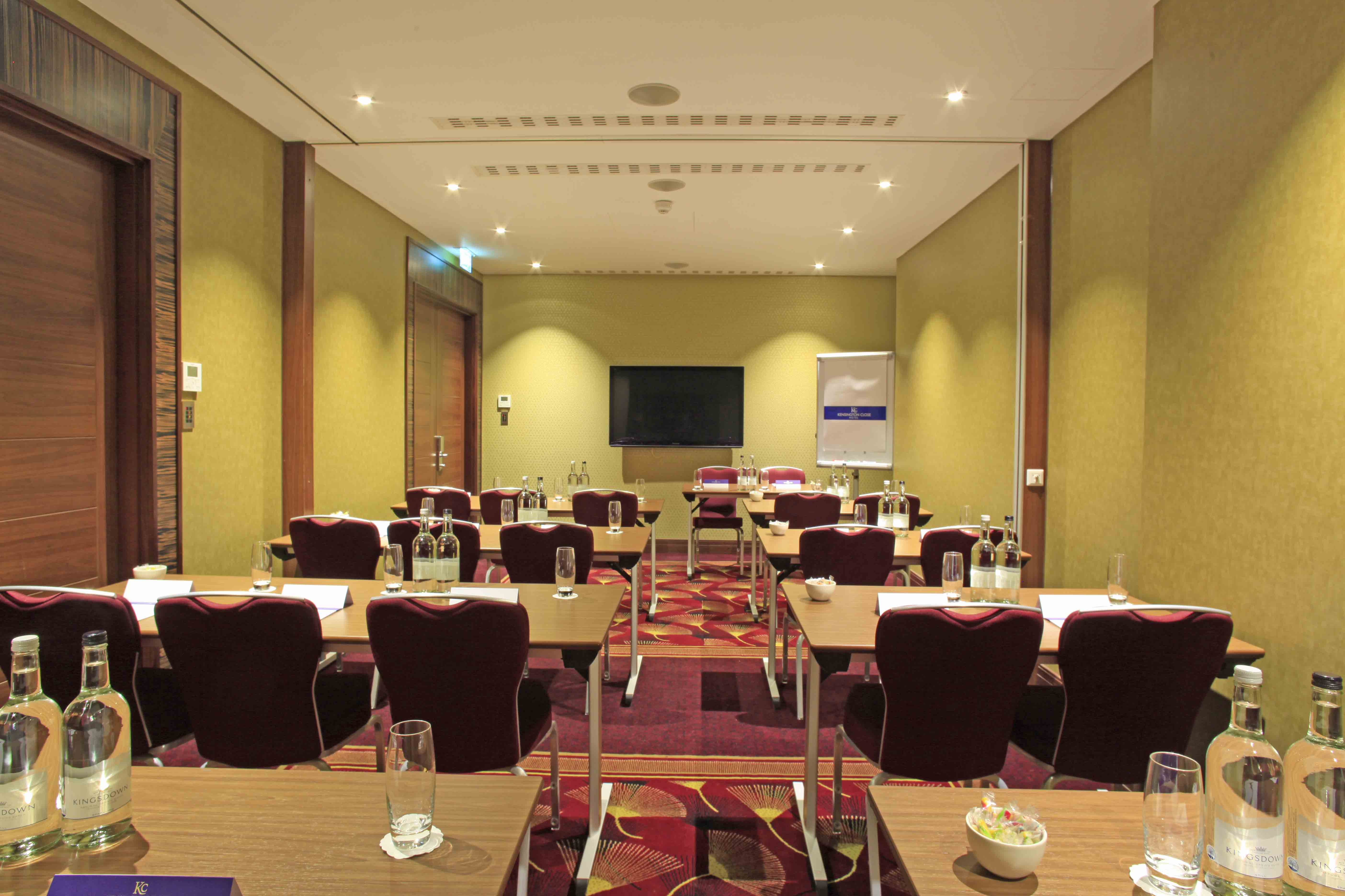 St James Suite at Holiday Inn Kensington: elegant meeting room ready for workshops and presentations.