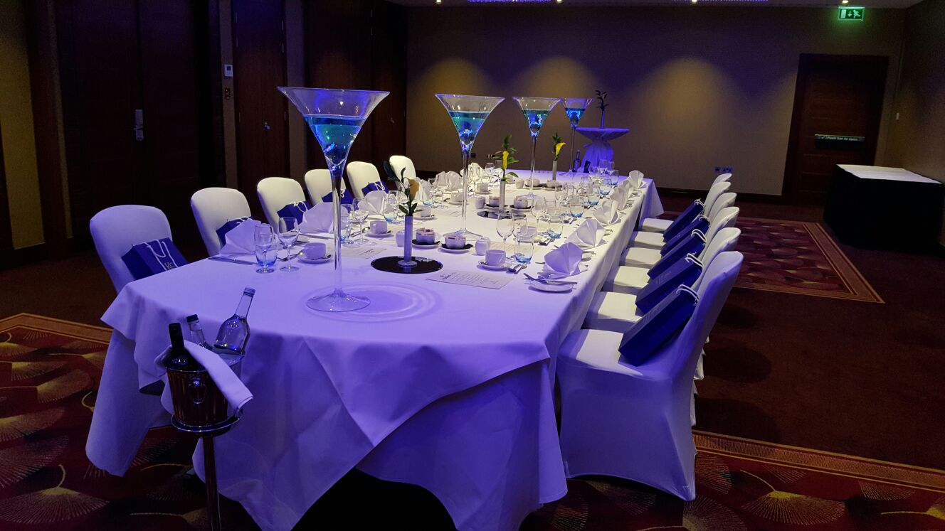 Windsor Suite banquet table with elegant centerpieces for corporate events, Holiday Inn Kensington.