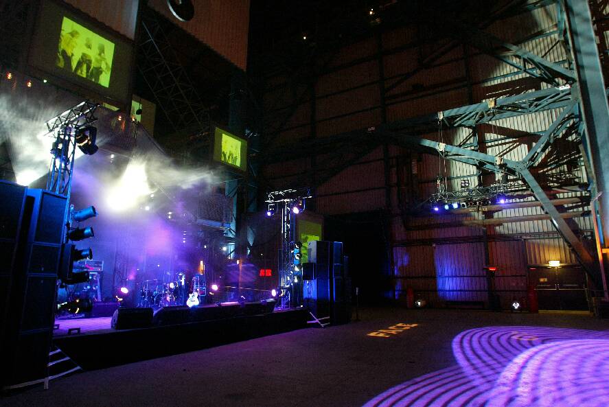 The Face of Steel venue with stage lighting for concerts and corporate events.