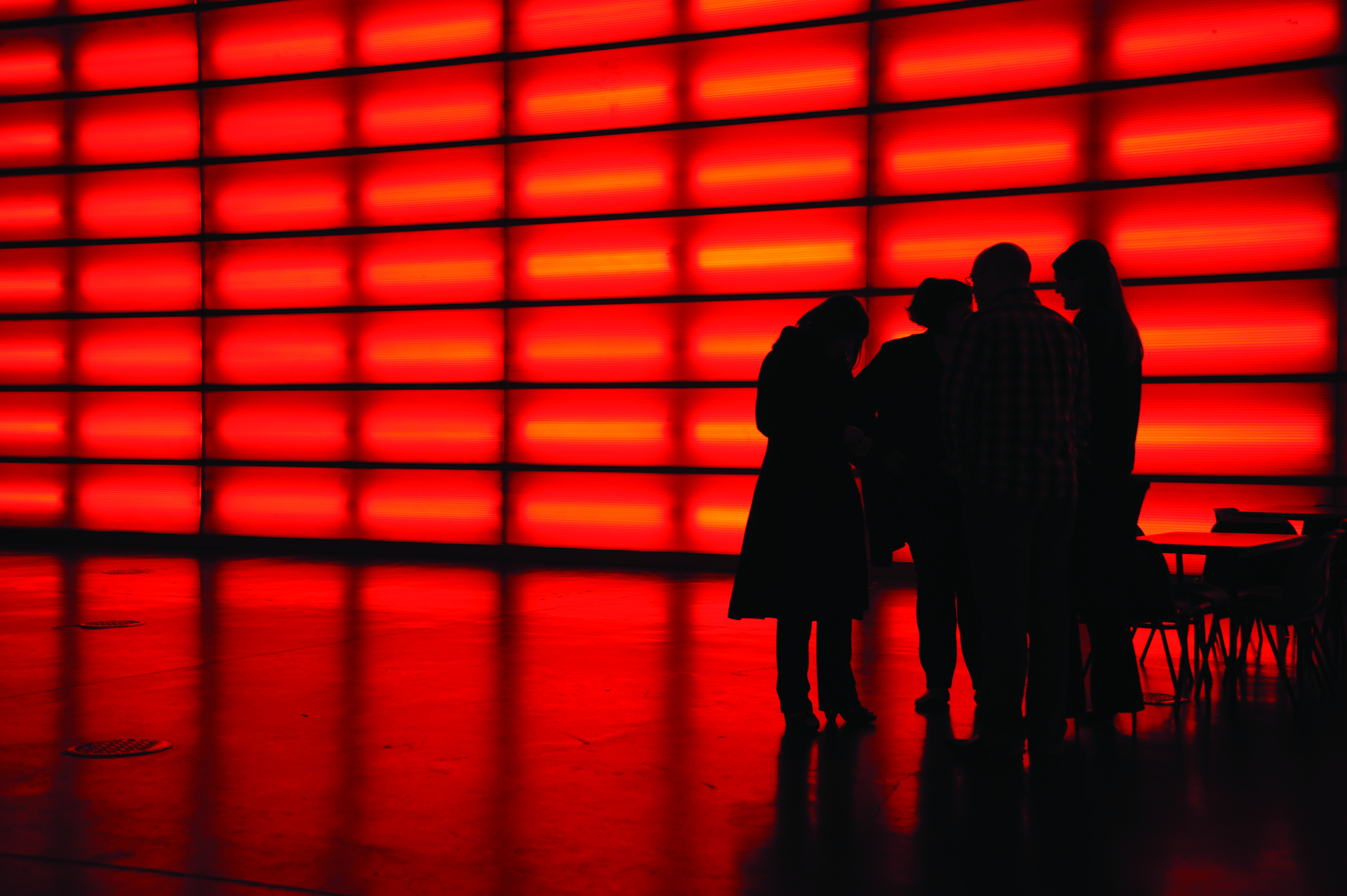 Professionals collaborating in The Red Hall, MAGNA for networking and brainstorming events.