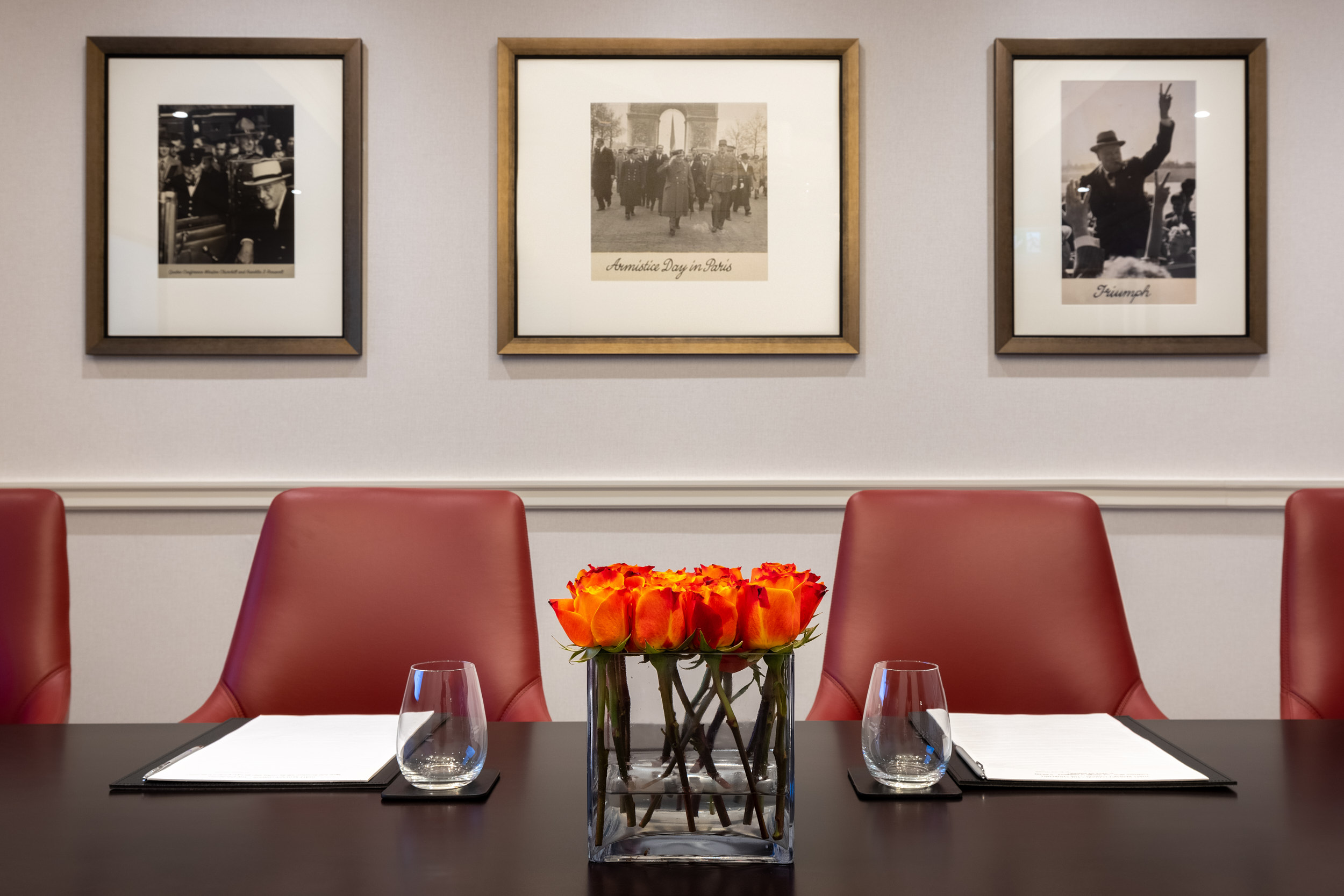Boardroom 2 at Hyatt Regency London with elegant red chairs for corporate meetings.