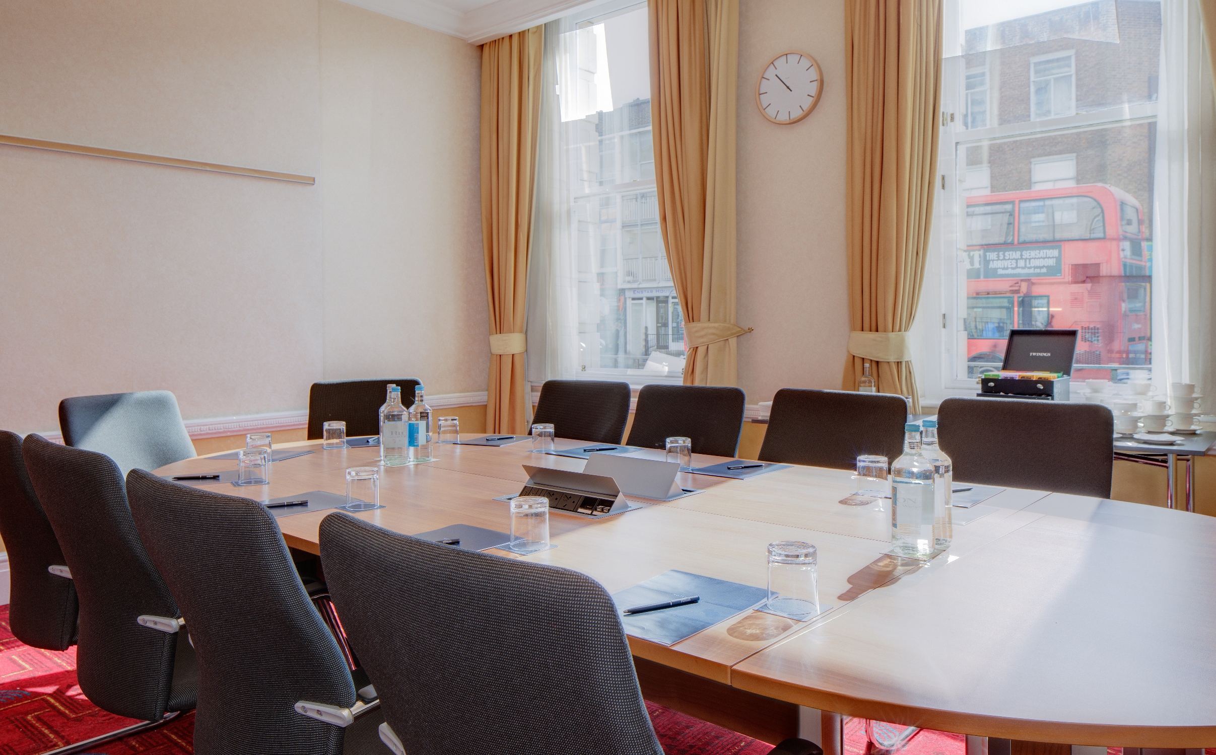 Meeting room at Tangley, Hilton London Paddington, with large table and natural light.