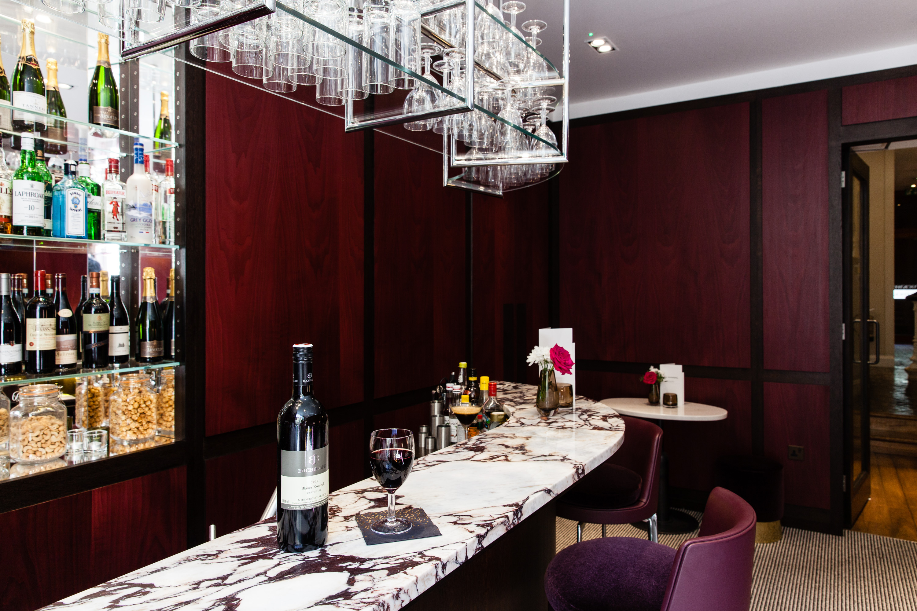 Sophisticated bar area in The Rockwell, ideal for networking events and cocktail receptions.