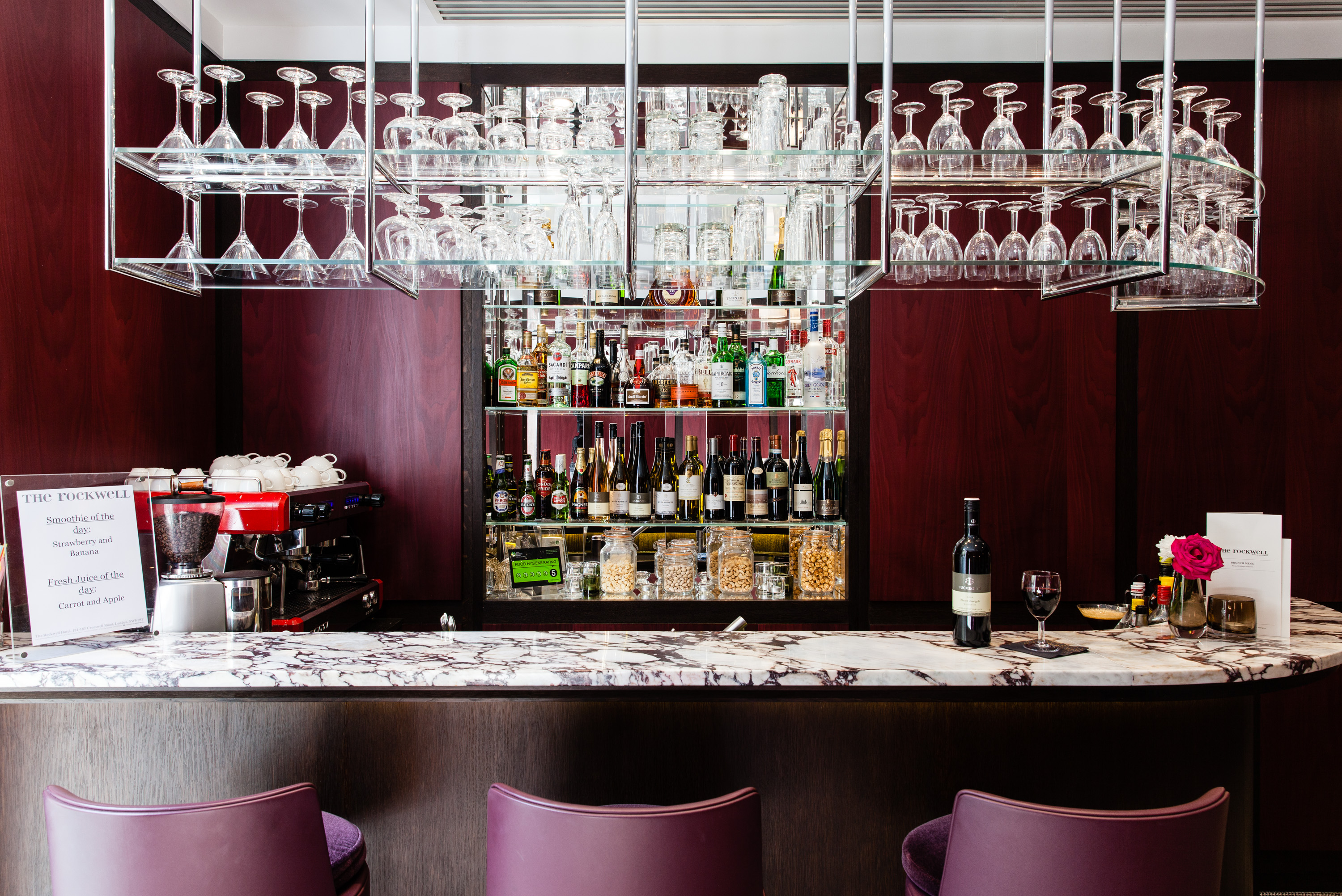 Sleek bar setup in The Rockwell meeting room for networking events and cocktail receptions.
