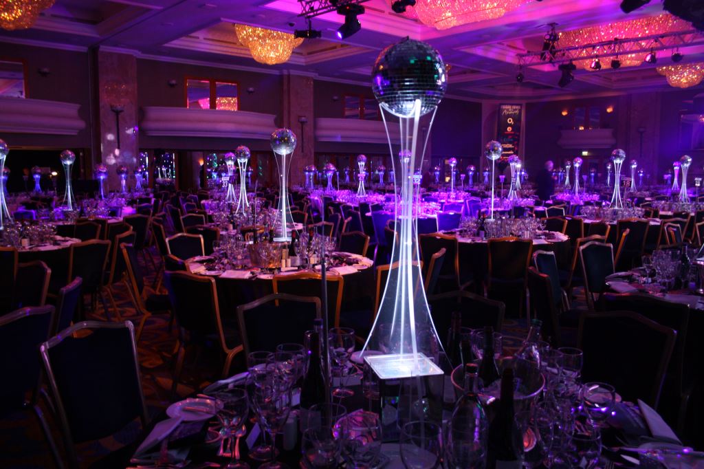 Grand Ballroom at London Hilton: elegant tables, modern lighting for formal events.