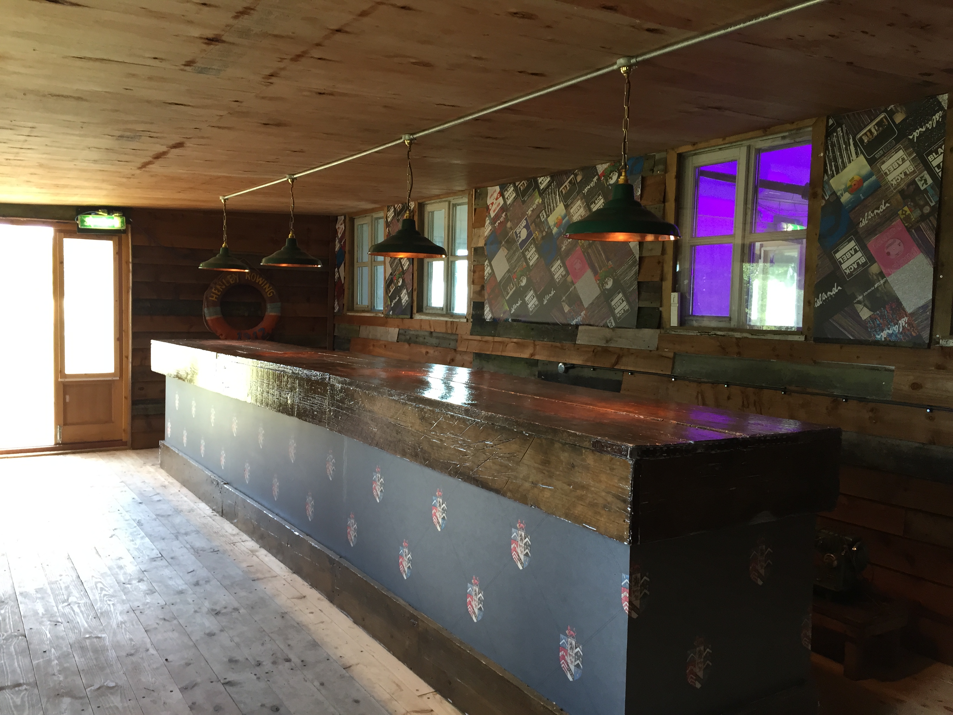 Rustic bar area at The Shack, Osea Island, ideal for networking events and cocktail receptions.