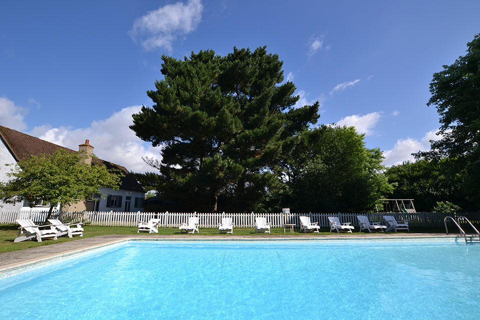 Osea Island Club House outdoor pool, ideal for summer events and networking gatherings.