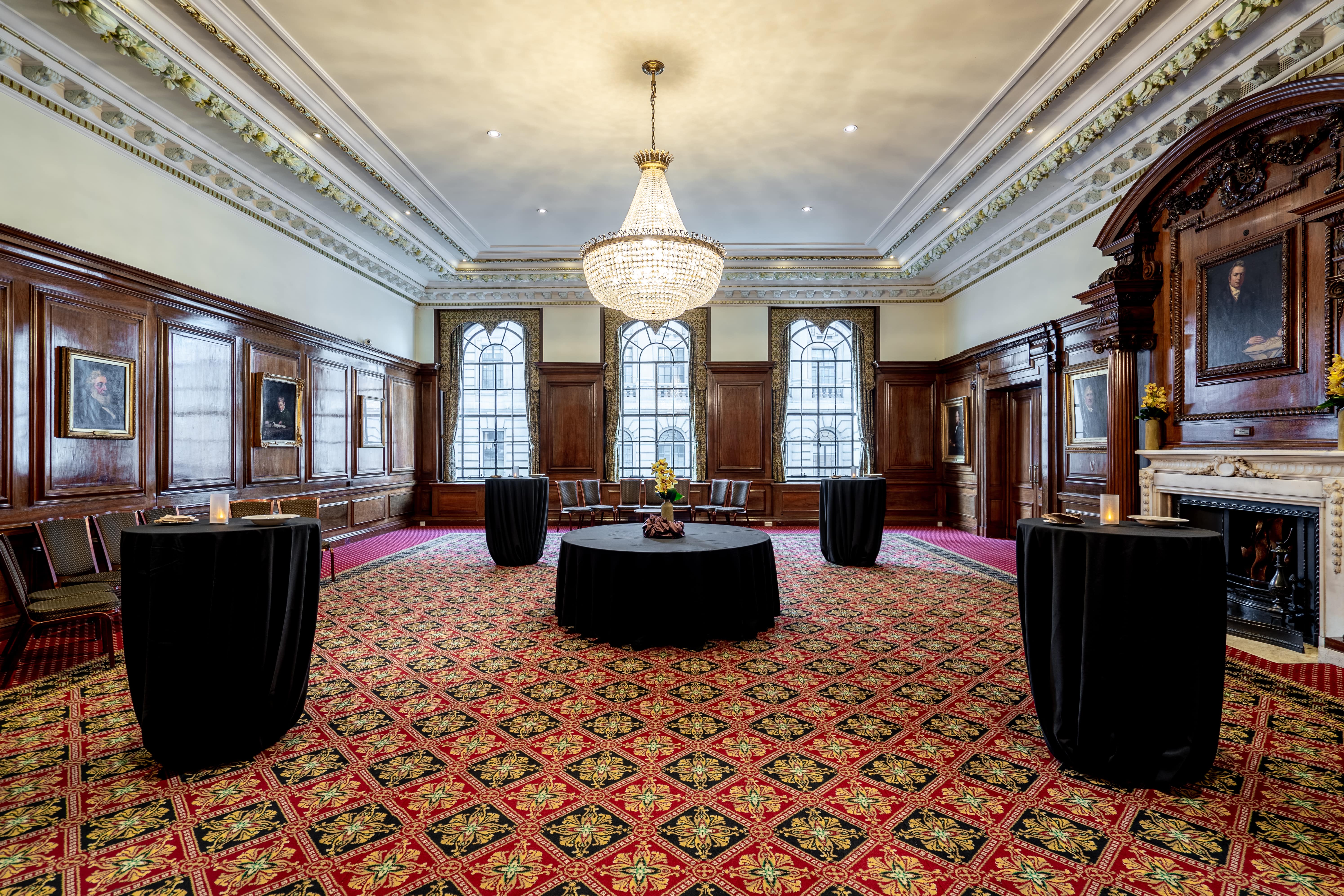 Brunel Room event space with elegant wood paneling, ideal for networking and receptions.
