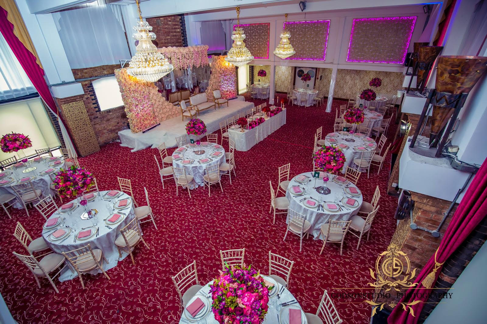 Lakeview Suite at Regents Lake: elegant wedding venue with chandeliers and floral decor.