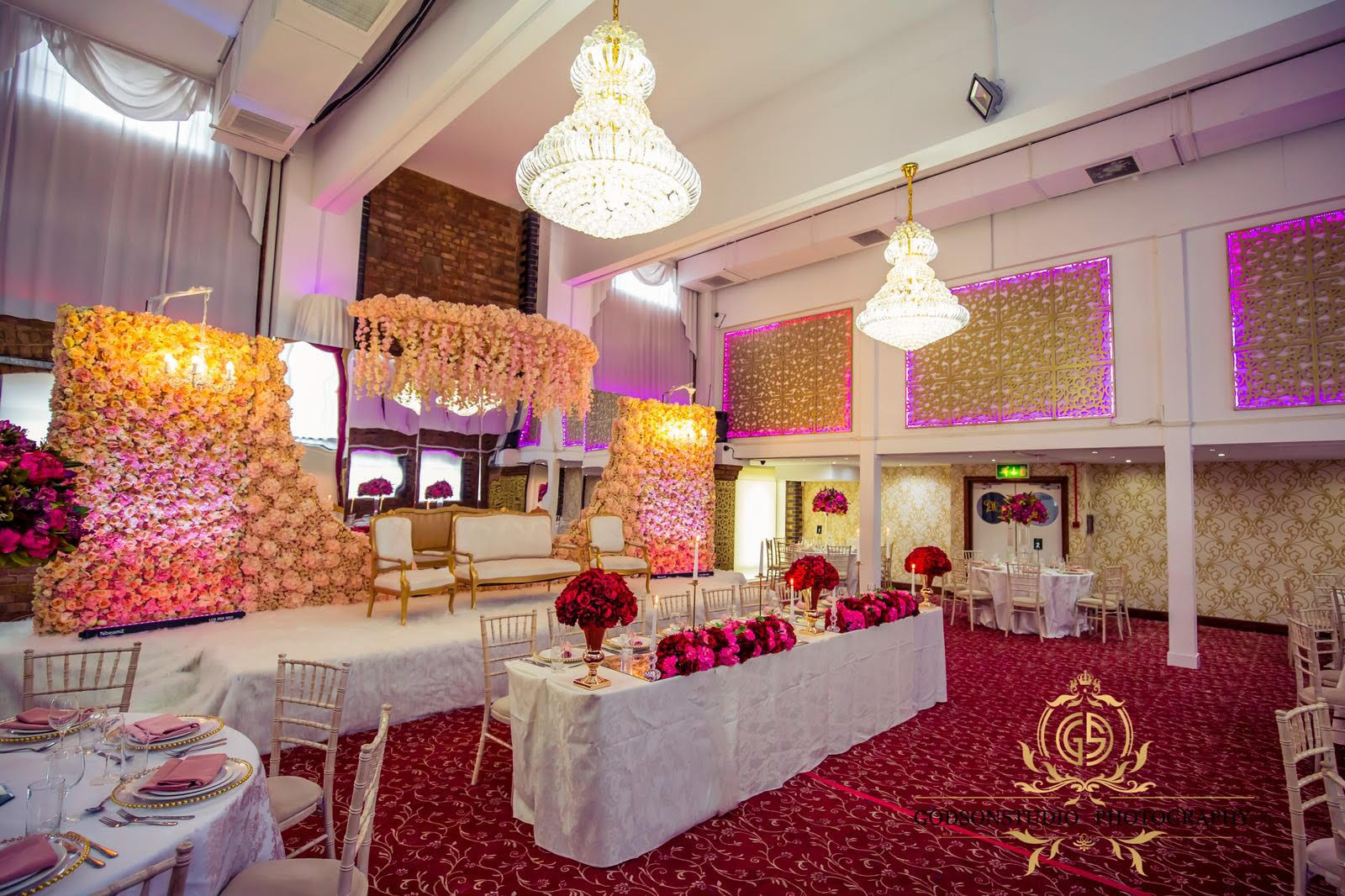 Lakeview Suite at Regents Lake: elegant wedding venue with floral backdrop and upscale decor.