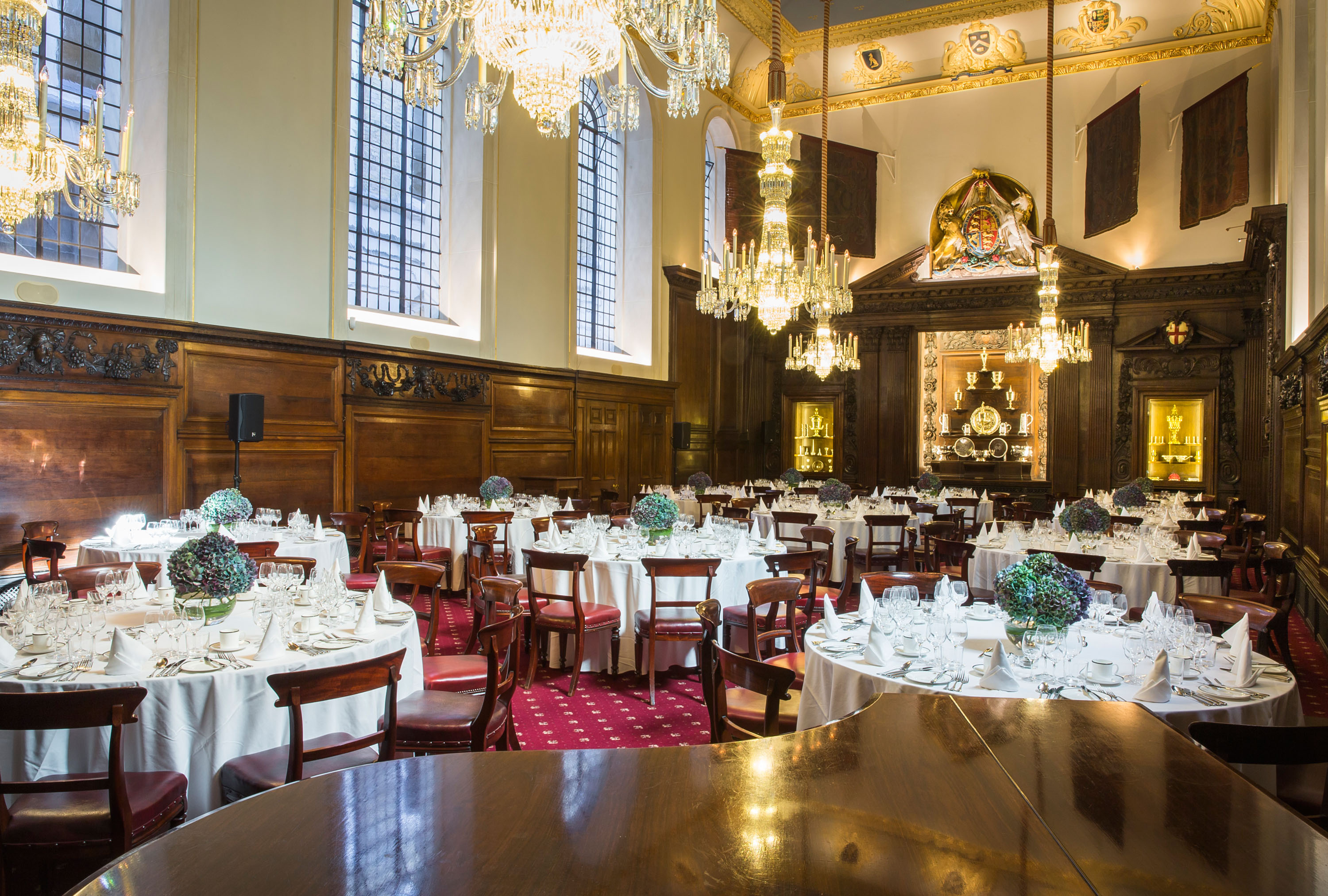 Elegant Livery Hall with chandeliers, ideal for upscale corporate events and weddings.