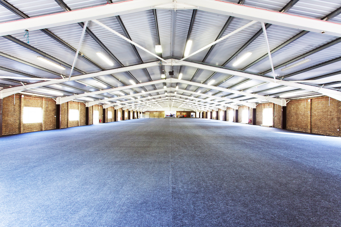 John Hendry Pavilion: spacious event venue with high ceilings for trade shows and exhibitions.