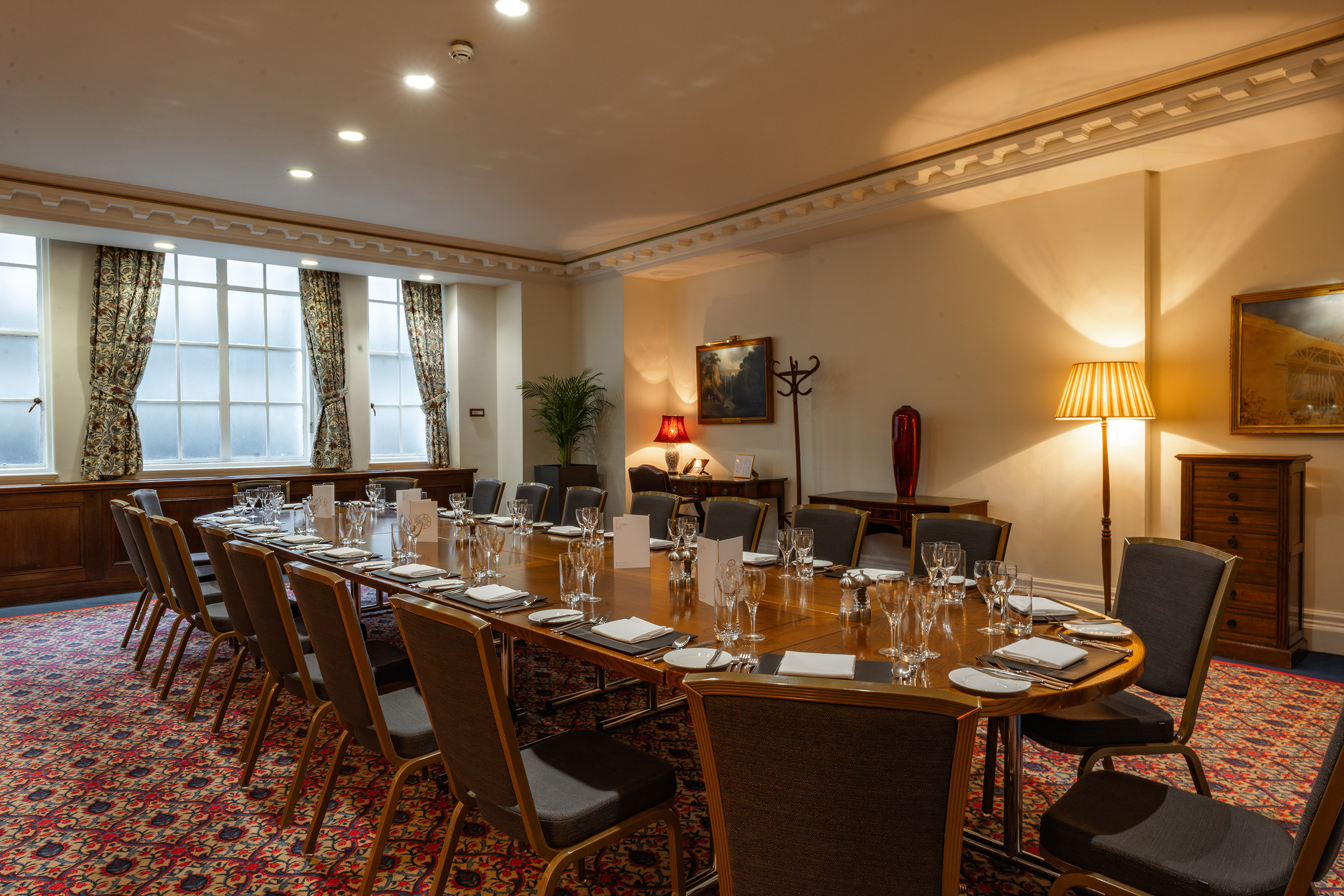 Classic boardroom, oval table, executive meeting, conference venue
