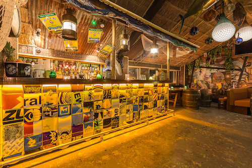 Vibrant Liars Lounge bar with eclectic decor, ideal for networking events and themed parties.