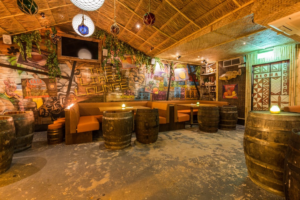 Liars Lounge at Cane and Grain: rustic decor, ideal for networking and social events.