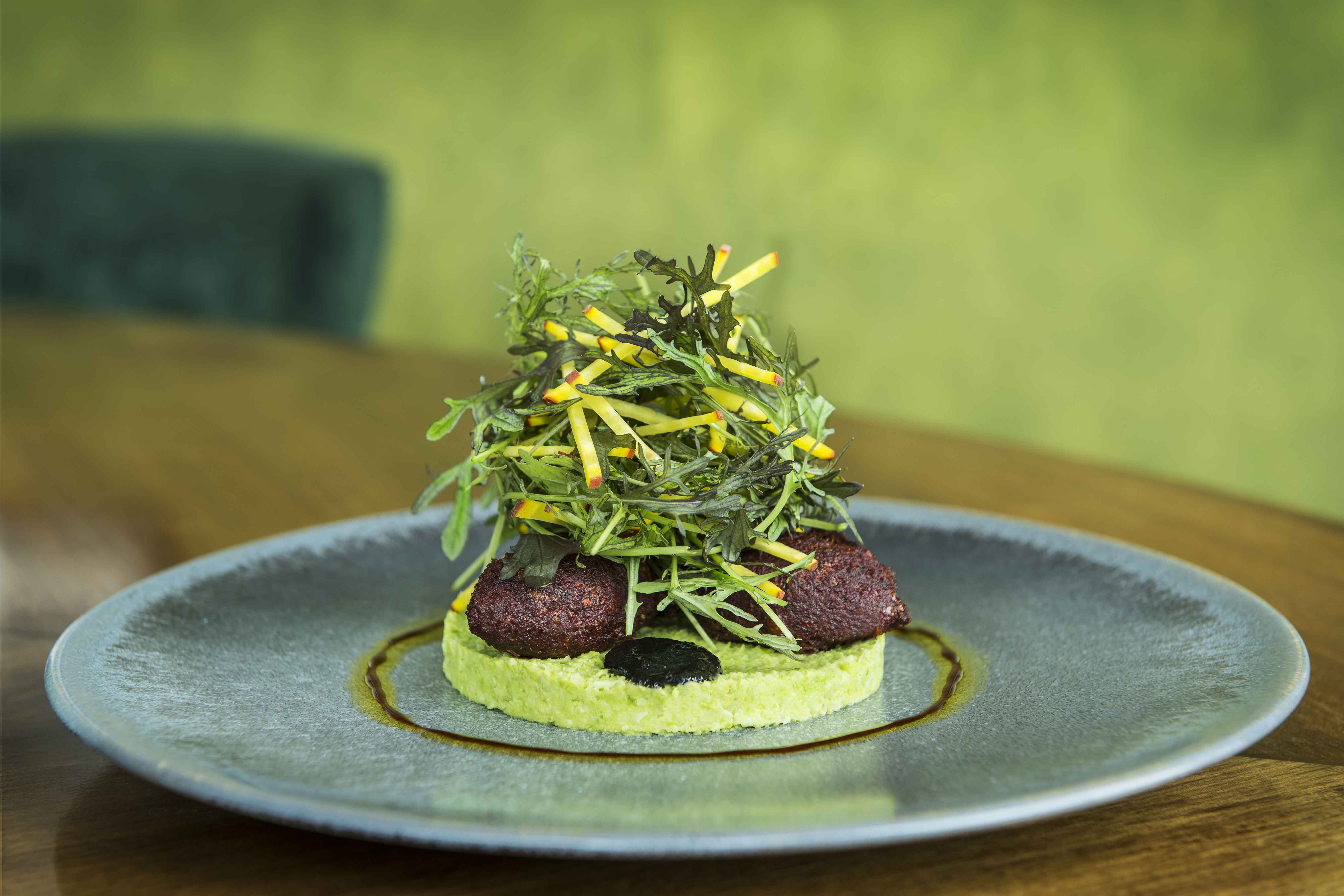 Private dining room with gourmet seafood dish for upscale events and catering.