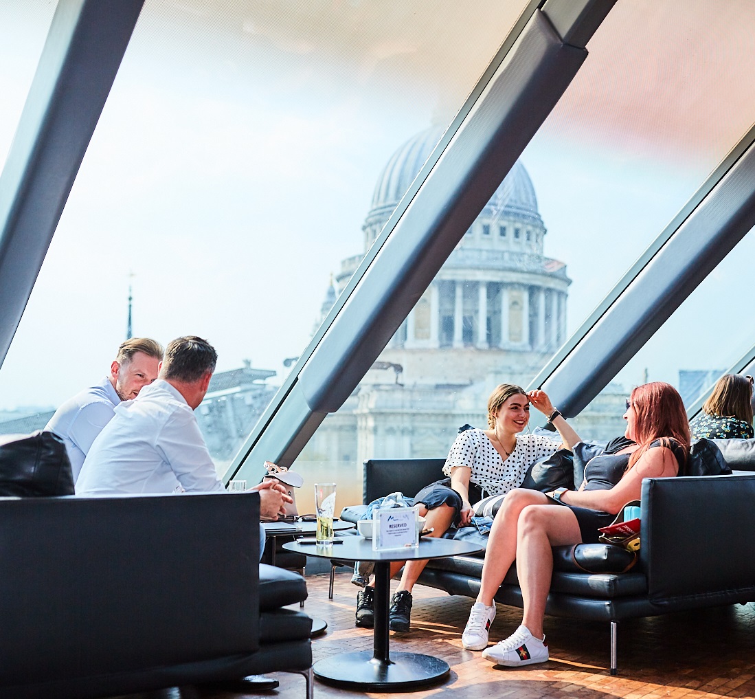 Stylish Bar Lounge in Madison with large windows, perfect for networking events.