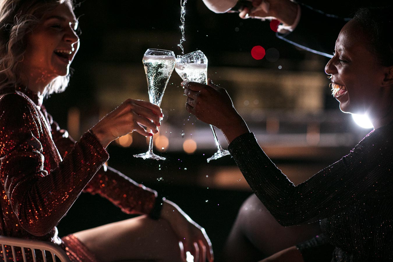Elegant couple toasting champagne at Upper Terrace, perfect for celebrations and networking.