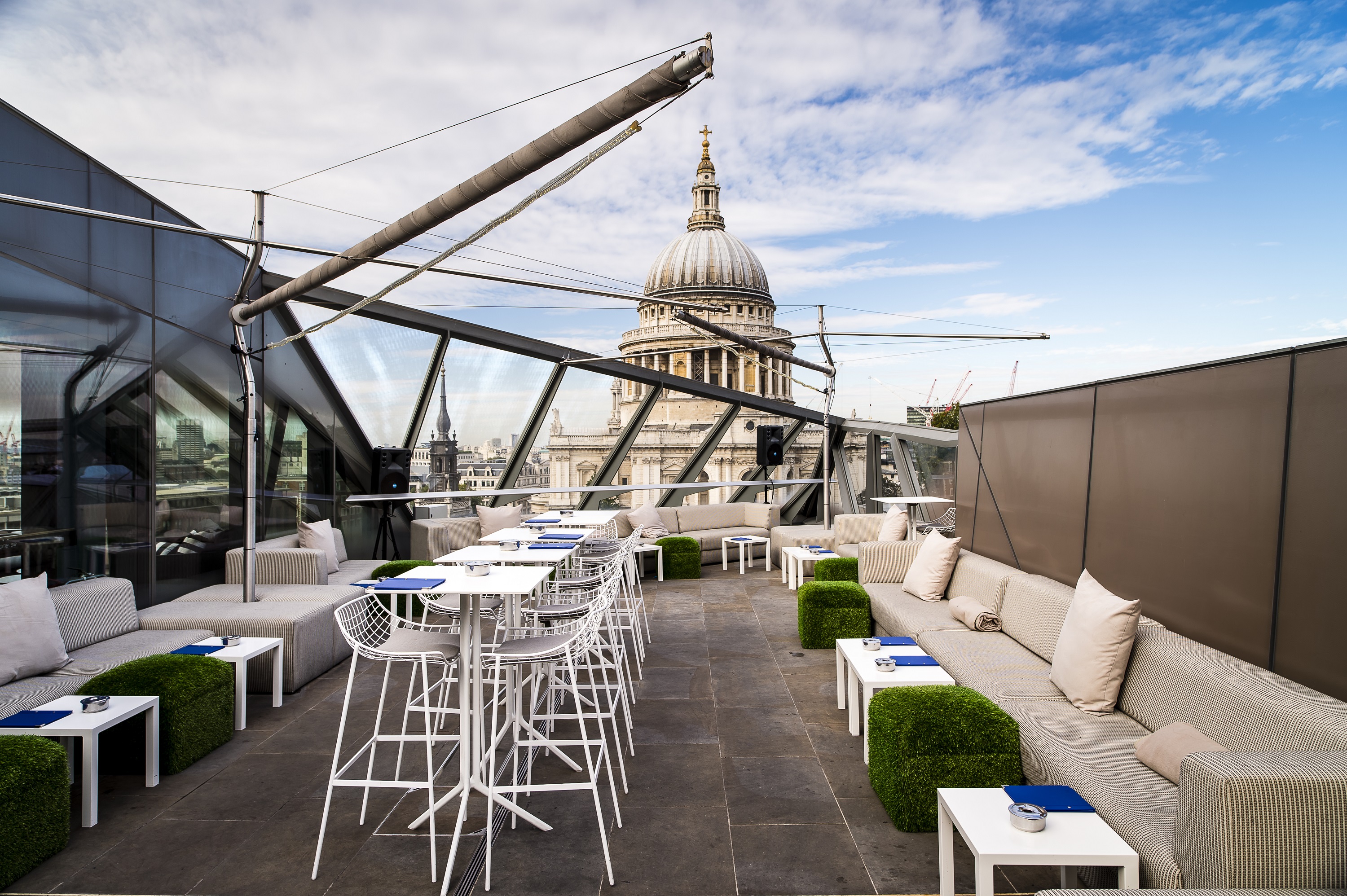 Rooftop venue in Madison with modern seating and iconic dome for upscale events.