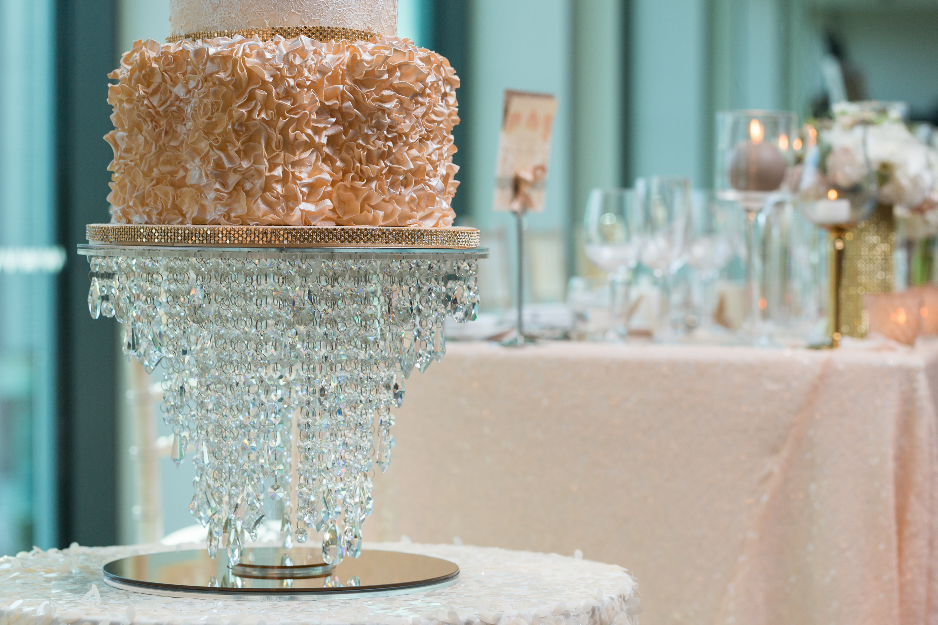 Elegant wedding cake display at Hotel Football's Stadium Suite, perfect for upscale events.