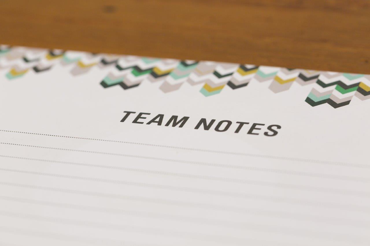 "Hotel Football 92 Suite notepad for team meetings, ideal for brainstorming and organization."
