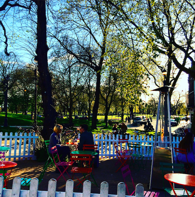 Vibrant outdoor terrace with colorful seating for casual networking events.