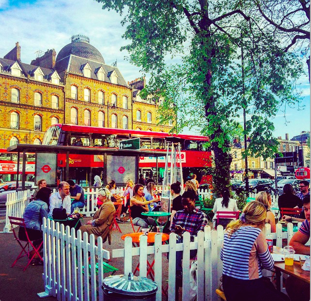 Vibrant outdoor venue with colorful seating for casual networking events and gatherings.