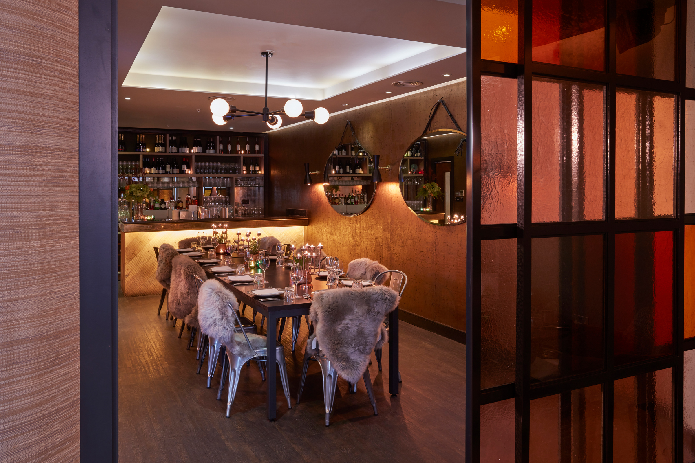 Private dining room with modern decor, ideal for intimate events and networking dinners.