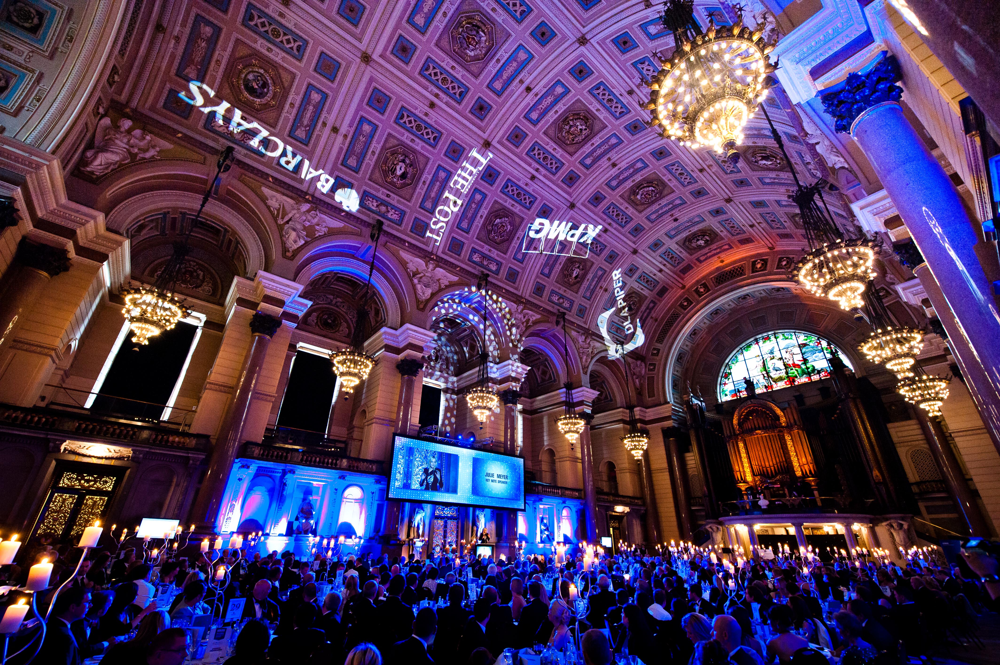 Elegant Great Hall event space with chandeliers, ideal for high-profile gatherings.