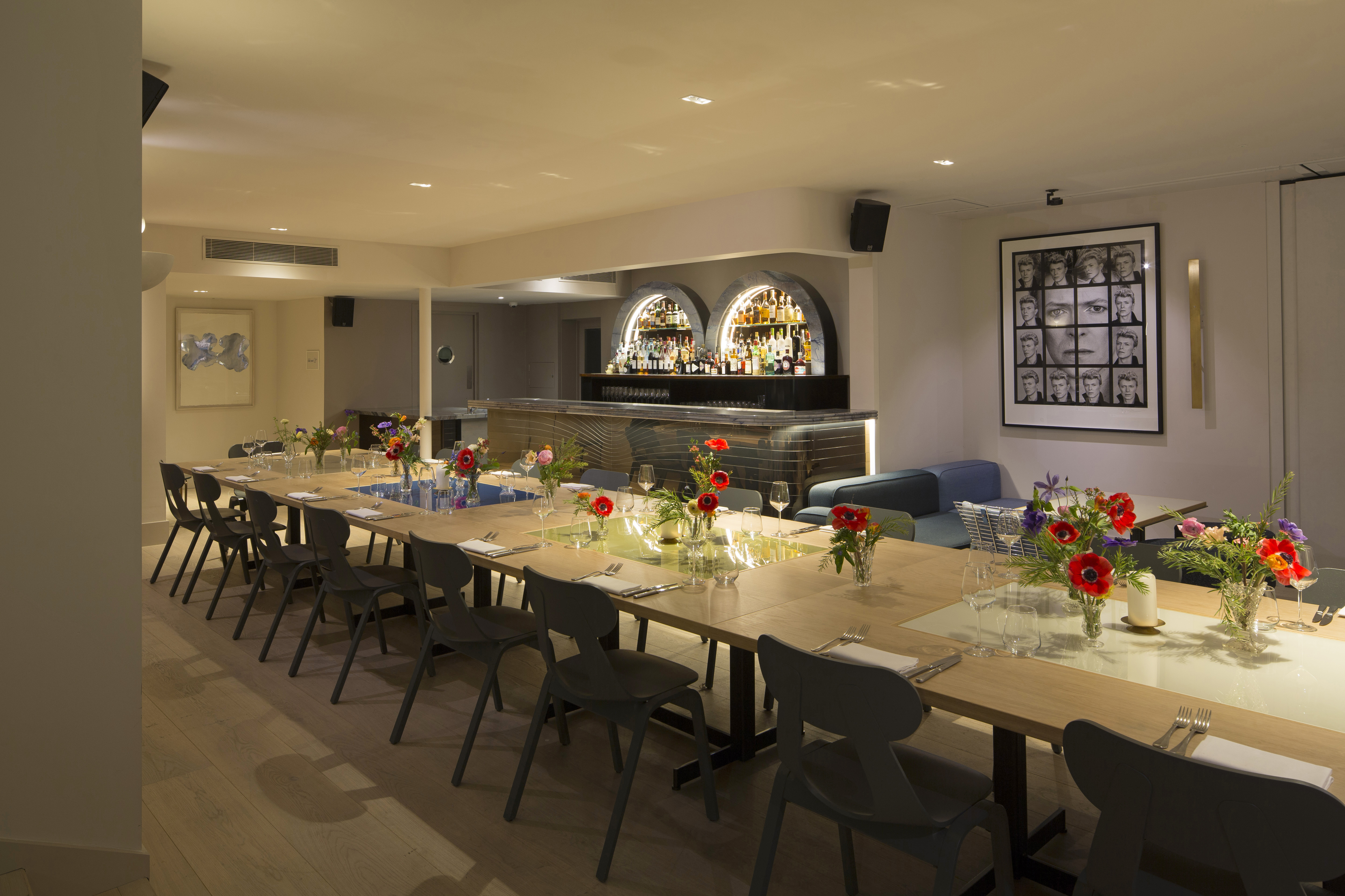 Gennaro Room at The Groucho Club: elegant event space with floral centerpieces for gatherings.