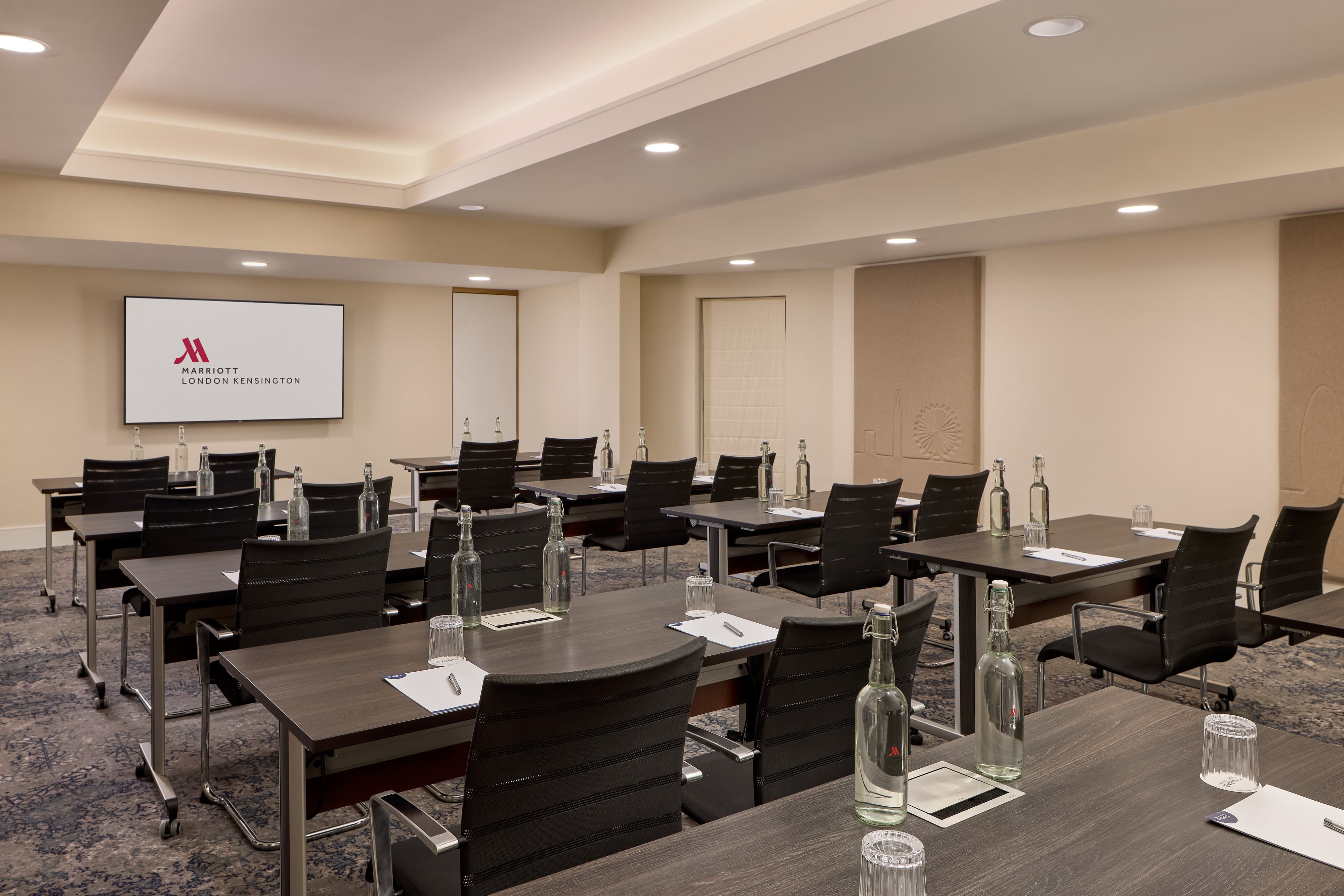 Classroom-style meeting space at London Marriott Kensington for training workshops and conferences.