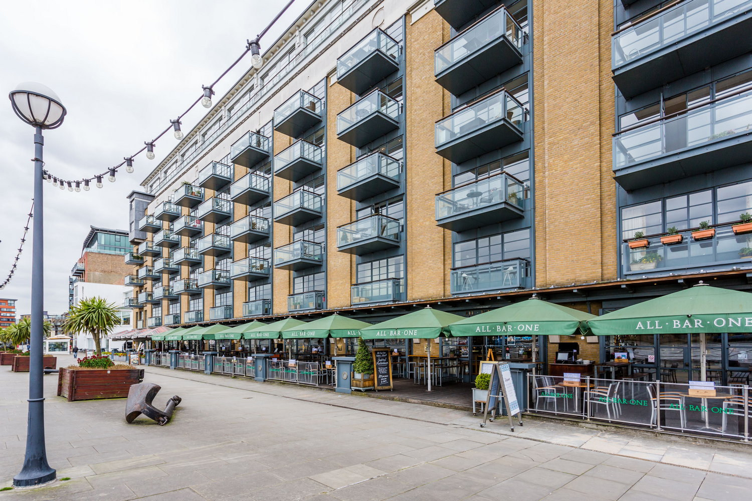Decked Terrace at All Bar One, vibrant outdoor seating for summer events and meetings.