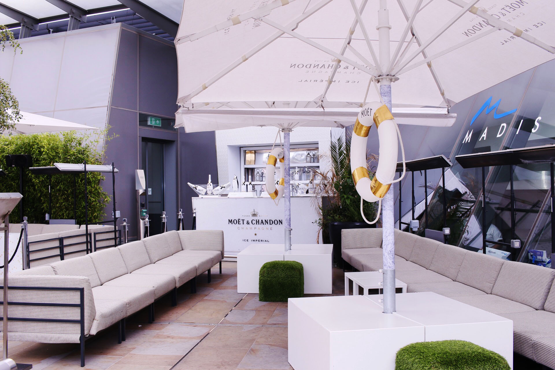 VIP Terrace in Madison: stylish outdoor event space with seating and bar for upscale gatherings.