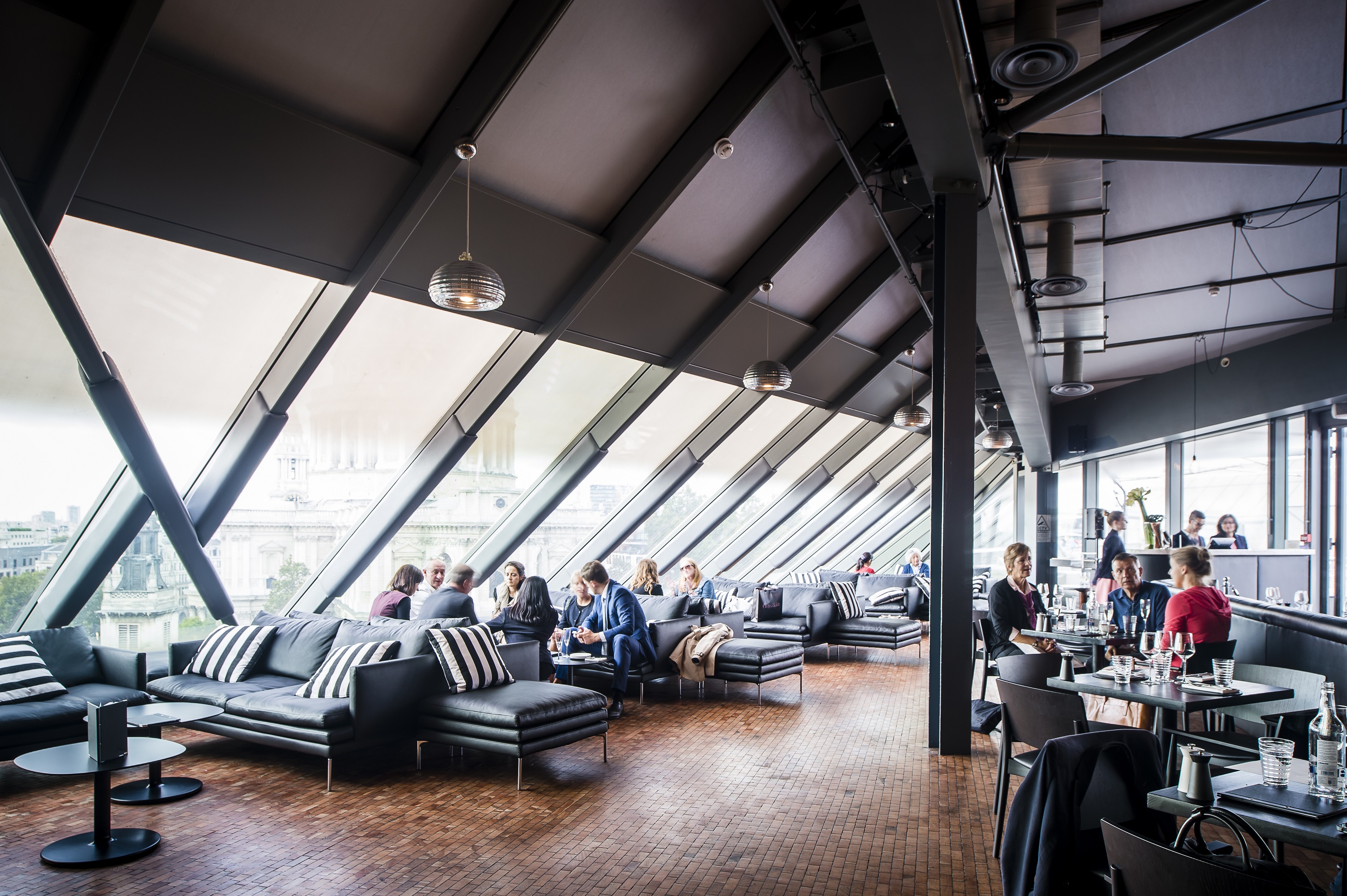 Modern Bar Lounge in Madison with large windows, perfect for cocktail receptions and meetings.