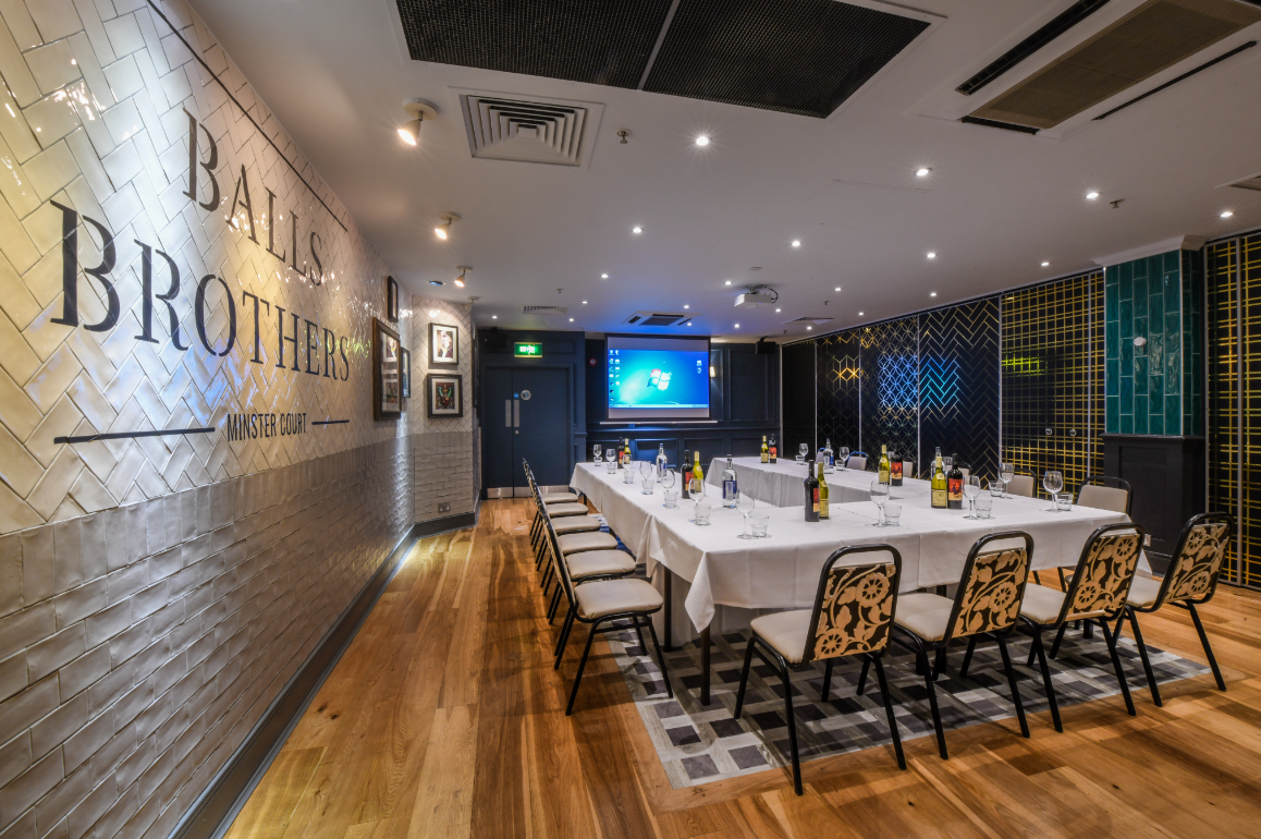 Minster Suite meeting room with elegant decor, ideal for corporate events and workshops.