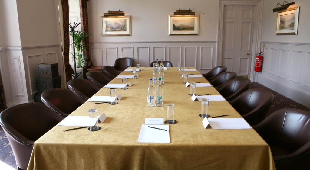 Elegant meeting room with gold tablecloth at Norton House Hotel & Spa for professional gatherings.
