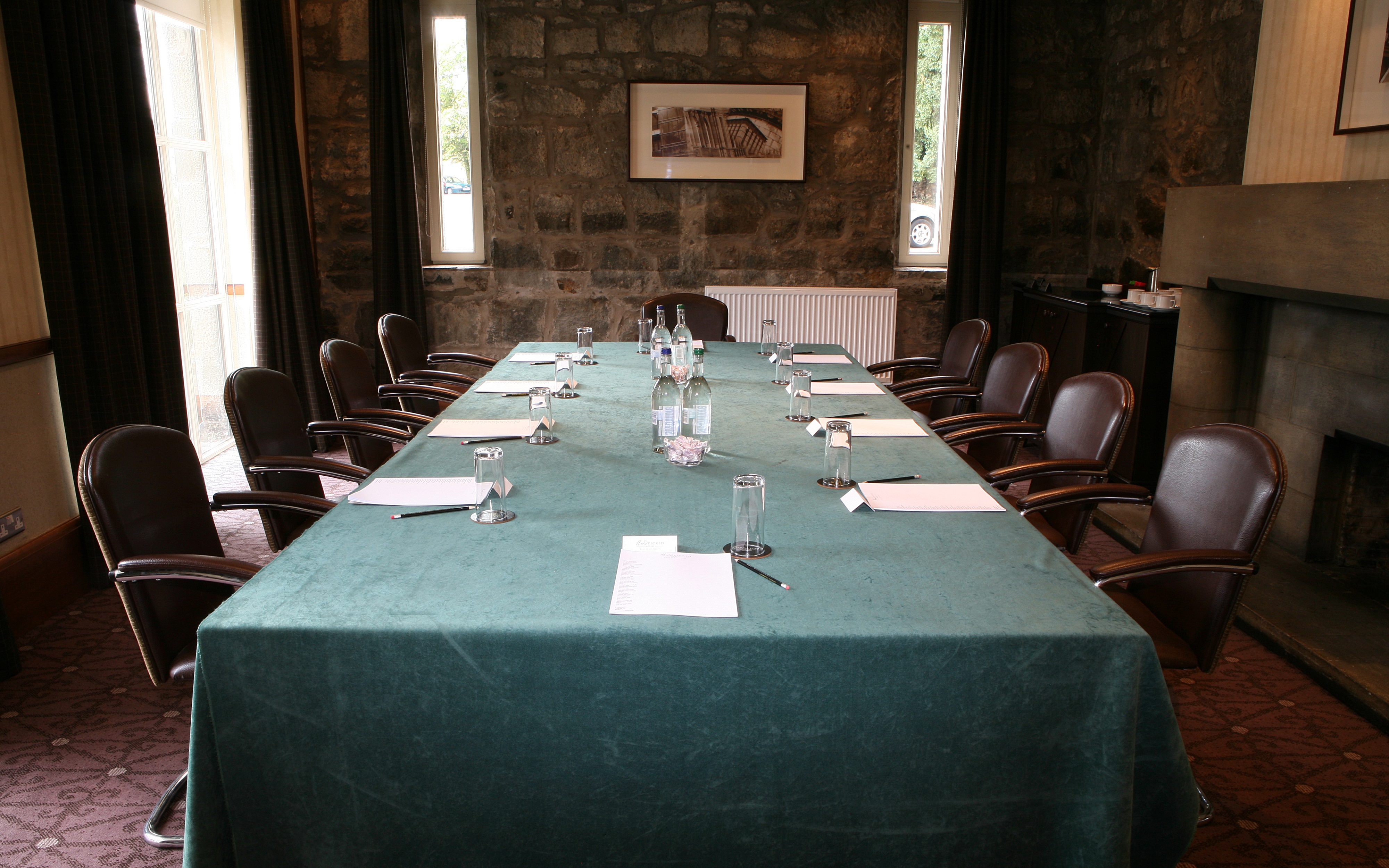 Meeting room at Norton House Hotel with long table, ideal for executive meetings and workshops.