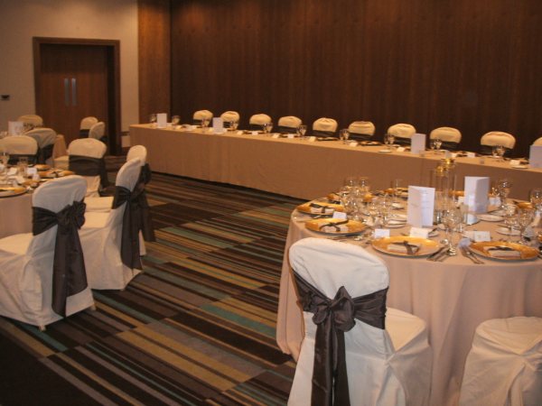 Elegant event space at Norton House Hotel with round tables, perfect for corporate gatherings.