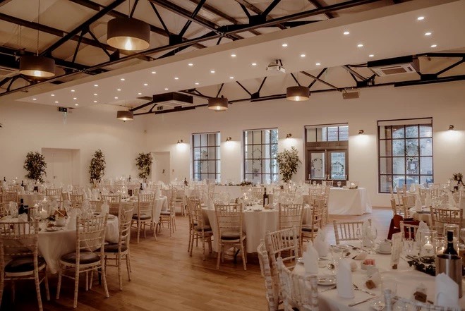 Spacious Fazeley Studios venue set for formal dinner, perfect for weddings and corporate events.