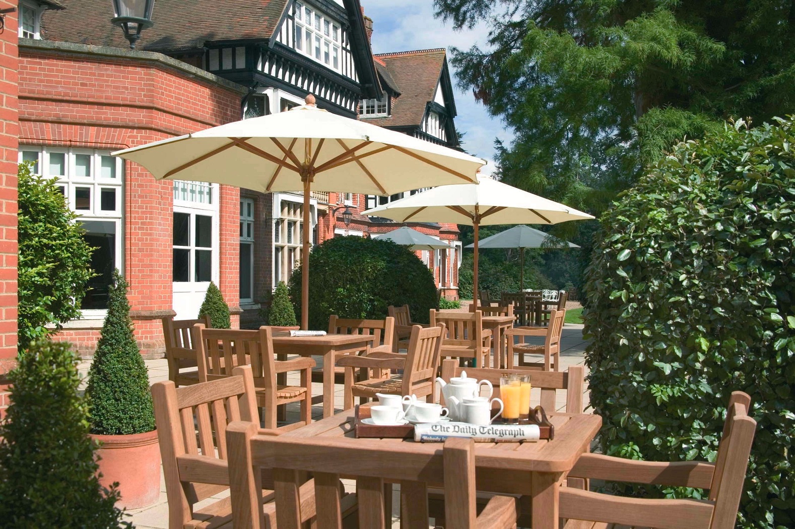 Prince of Wales Suite outdoor space with tables, ideal for networking events and meetings.