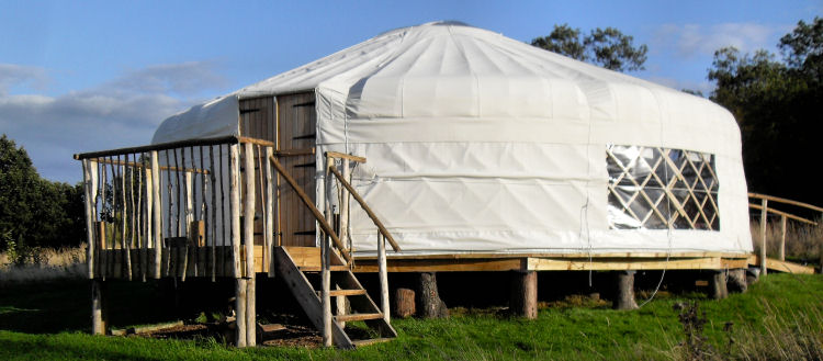 Charming yurt venue for unique outdoor weddings and retreats in Plush Tents Glamping.