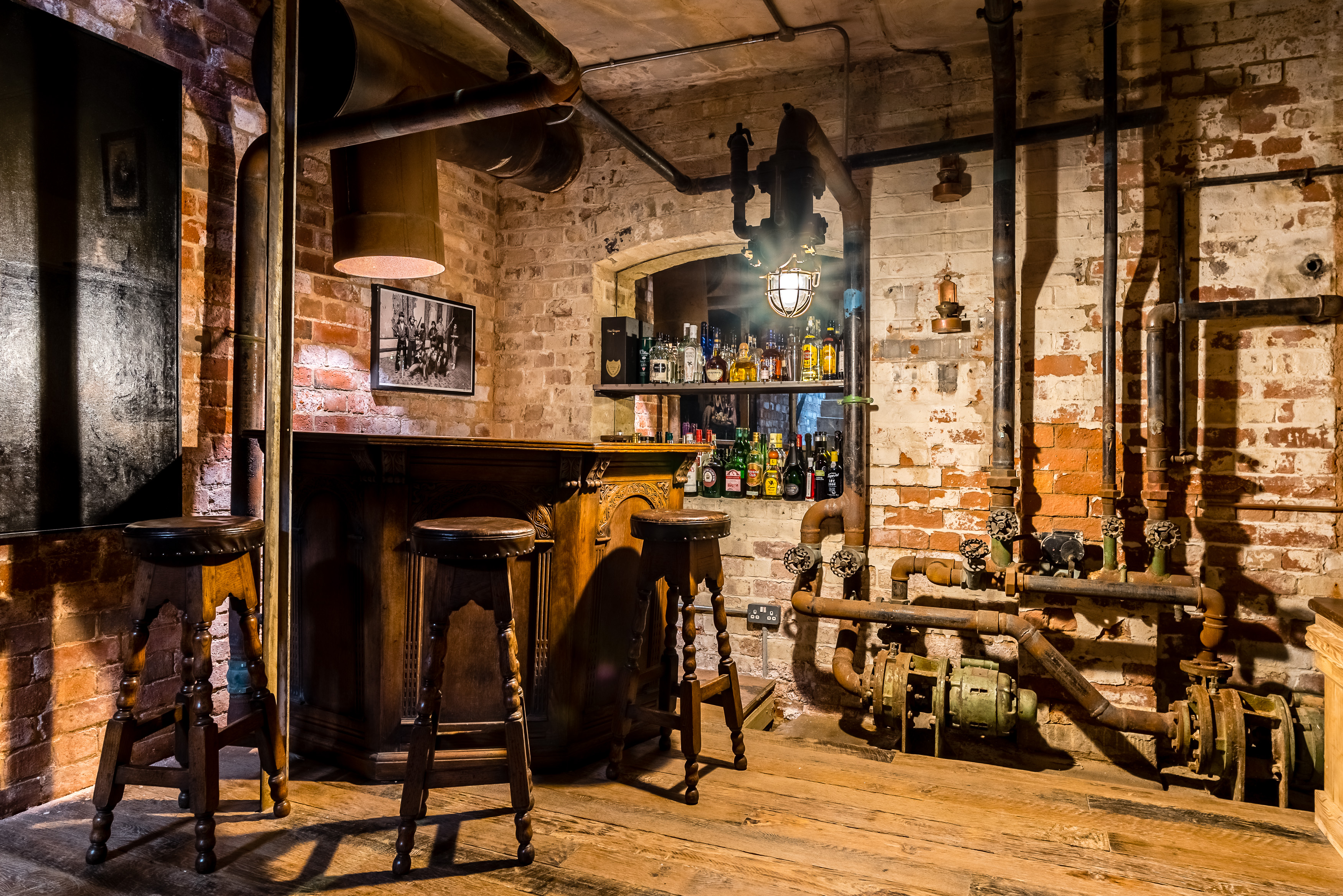 Rustic venue with exposed brick walls, ideal for intimate gatherings and themed events.